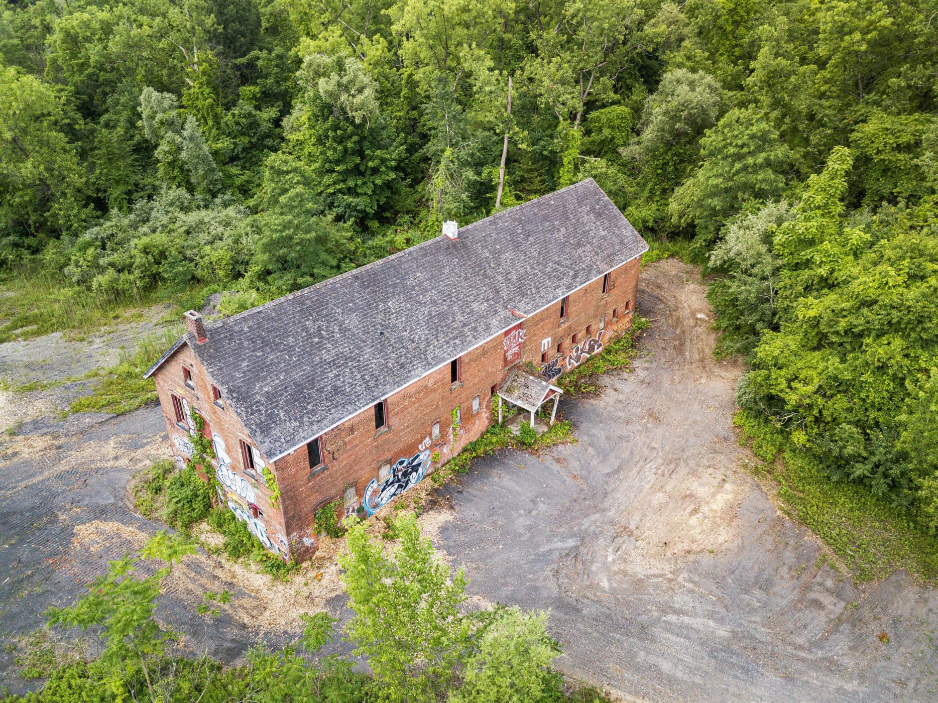 The Shultz Mule Barn, a historic brick structure associated with the former Shultz Brickyard, which closed around 1980, may be re-developed in the future. (Photo: Pierce Johnston / Courtesy of www.scenichudson.org)