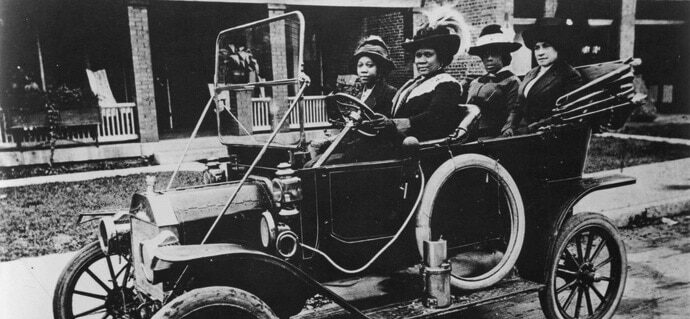 Madam C.J. Walker drives three friends in an early automobile, 1911.