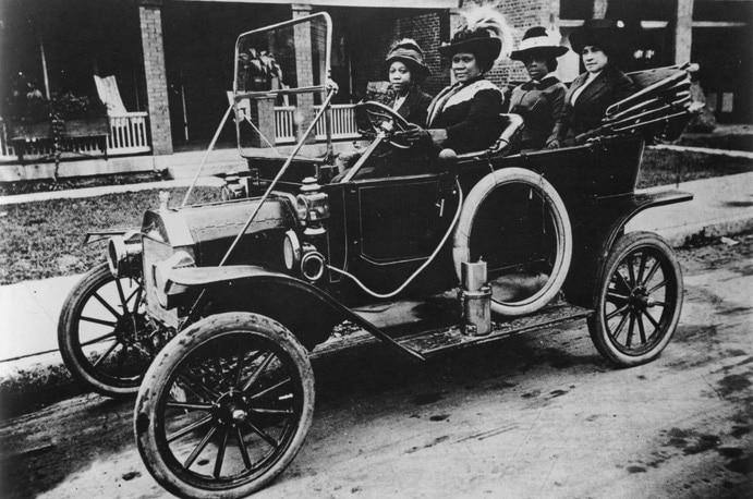 Madam C.J. Walker drives three friends in an early automobile, 1911.